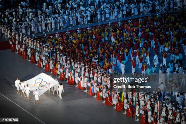 The Olympic Flag enters the stadium during the Opening Ceremony for the Beijing 2008 Olympic Games at the National Stadium on August 8 in Beijing,...