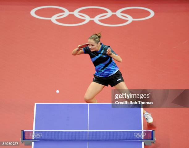 Iulia Necula of Romania plays against Chen Wang of the United States during their Women's Team Bronze Play-off Round 1 match at the Peking University...