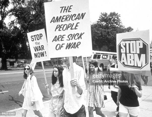 Students march with anti-war placards on the campus of the University of California at Berkeley, California, 1969.