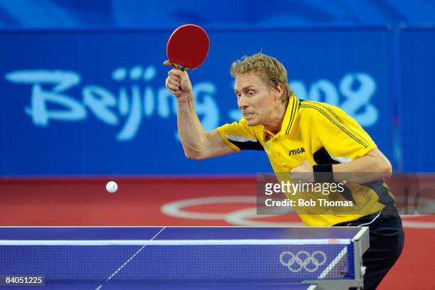 Jorgen Persson of Sweden plays a shot in the Quarter Final of the Men's Singles Table Tennis event against Zoran Primorac of Croatia held at the...