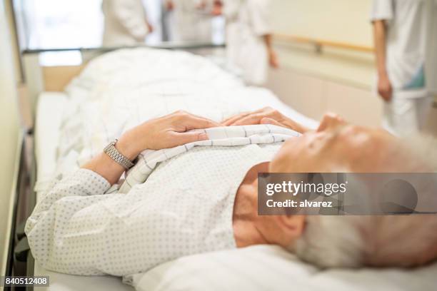 sick man on hospital gurney - unconscious stock pictures, royalty-free photos & images