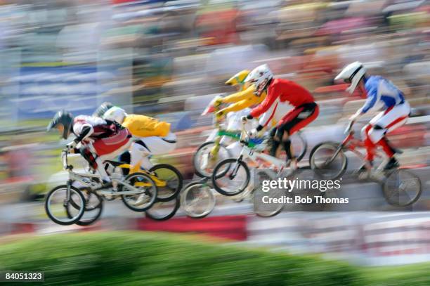 Racers compete in the Women's BMX semifinals held at the Laoshan Bicycle Moto Cross Venue during Day 14 of the Beijing 2008 Olympic Games on August...