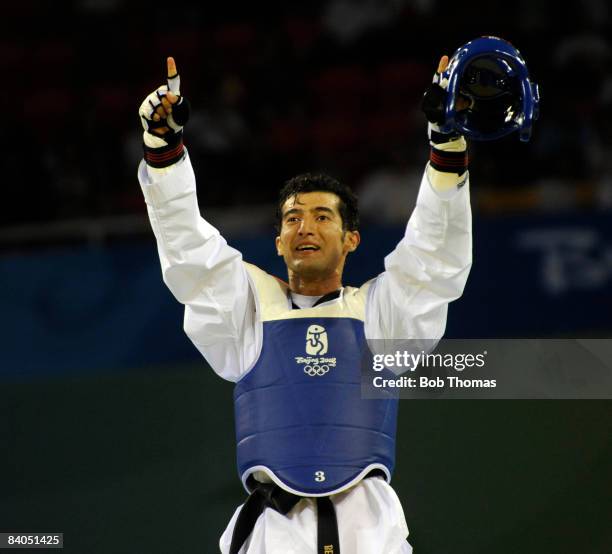 Guillermo Perez of Mexico celebrates victory in the taekwondo Men's -58kg Final at the University of Science and Technology Gymnasium during Day 12...