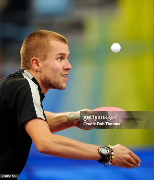 Michael Maze of Denmark playing against Zoran Primorac of Croatia during their men's table tennis single preliminary match during Day 12 of the...