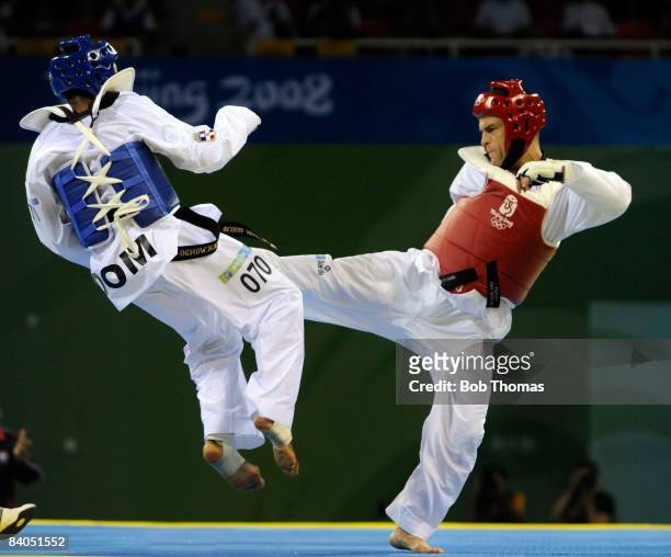 Yulis Gabriel Mercedes of the Dominican Republic against Juan Antonio Ramos of Spain during the Men's taekwondo -58kg at the University of Science...