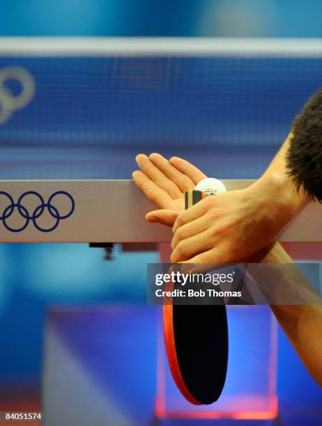 Dimitrij Ovtcharov of Germany plays against Adrian Crisan of Romania during their men's table tennis single preliminary match during Day 12 of the...