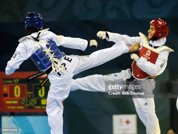 Shu-Chun Yang of Taipei against Sara Khosh Jamal of Iran during the Women's taekwondo -49kg at the University of Science and Technology Gymnasium...