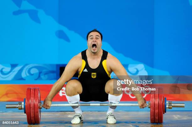 Almer Velagic of Germany during the Men's 105 kg group weightlifting event at the Beijing University of Aeronautics & Astronautics Gymnasium on Day...