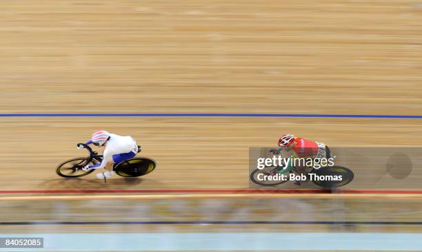 Victoria Pendleton of Great Britain with Simona Krupeckaite of Lithuania during the Women's Sprint Quarter Finals event at the Laoshan Velodrome on...