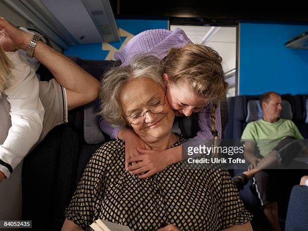family on train - human limb stock pictures, royalty-free photos & images