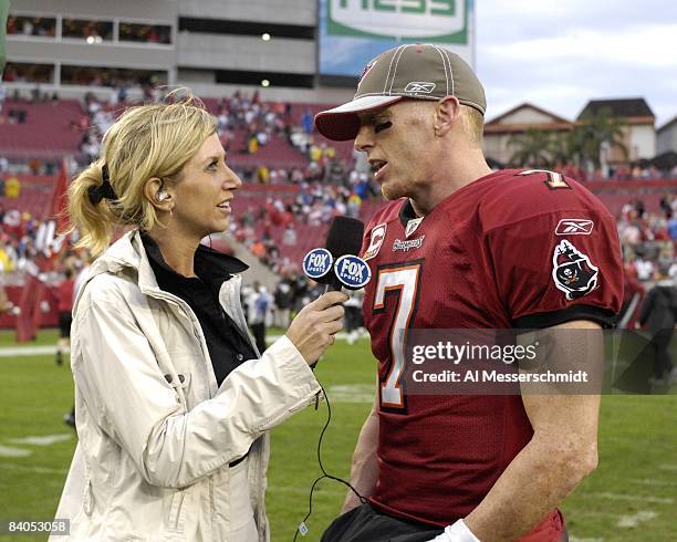 TAMqA, FL FOX sideline reporter Laura Okmin talks with Quarterback Jeff Garcia of the Tampa Bay Buccaneers after play against the New Orleans Saints...