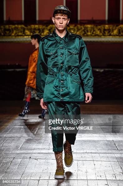A model walks the runway during A La Garconne fashion show as part of ...