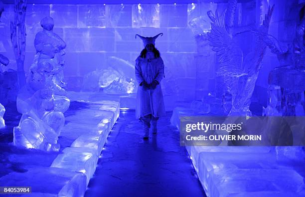 Girl walks among ice sculptures in Rovaniemi, on December 16, 2008. Rovaniemi's Christmas season is in full swing, teeming mainly with families with...