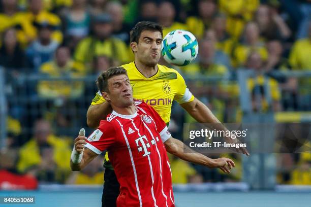 Sokratis of Dortmund and Thomas Mueller of Muenchen battle for the ball during the DFL Supercup 2017 match between Borussia Dortmund and Bayern...