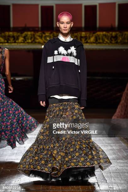 Model walks the runway during A La Garconne fashion show as part of Sao Paulo N44 Fashion Week Spring/Summer 2018 on August 26, 2017 in Sao Paulo,...