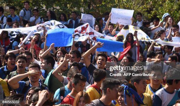 High school students shout slogans during a protest demanding a better education sytem, infrastructure and budget outside the Ministry of Education,...