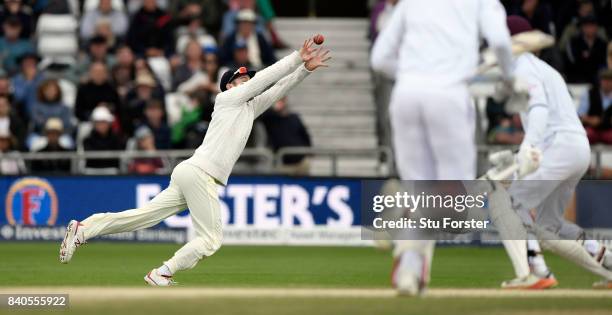 England sub fielder Mason Crane dives to catch Roston Chase during day five of the 2nd Investec Test Match between England and West Indies at...