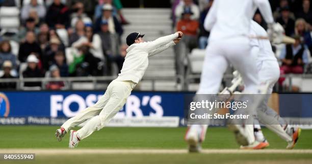 England sub fielder Mason Crane dives to catch Roston Chase during day five of the 2nd Investec Test Match between England and West Indies at...