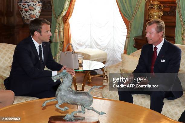 French President Emmanuel Macron meets with Grand Duke of Luxembourg, Henri, at the Palais grand-ducal in Luxembourg on August 29, 2017. / AFP PHOTO...