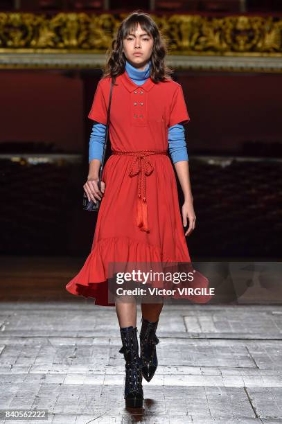 Model walks the runway during A La Garconne fashion show as part of Sao Paulo N44 Fashion Week Spring/Summer 2018 on August 26, 2017 in Sao Paulo,...