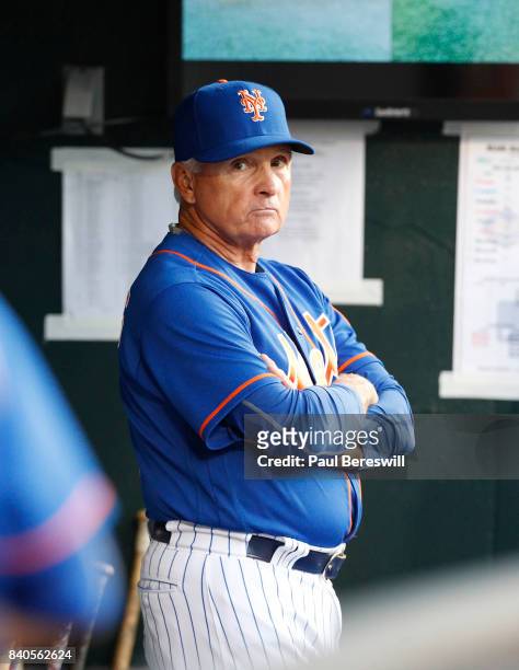 Manager Terry Collins of the New York Mets watches in the dugout during the first inning in an MLB baseball game against the Miami Marlins on August...