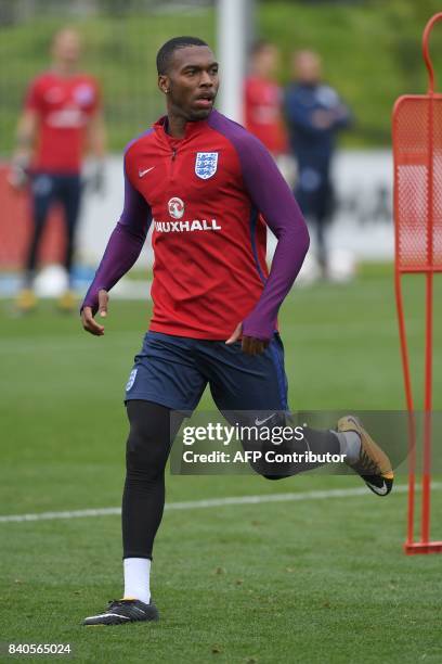 England's striker Daniel Sturridge attends a training session at St George's Park in Burton-on-Trent on August 29 as part of an England football team...