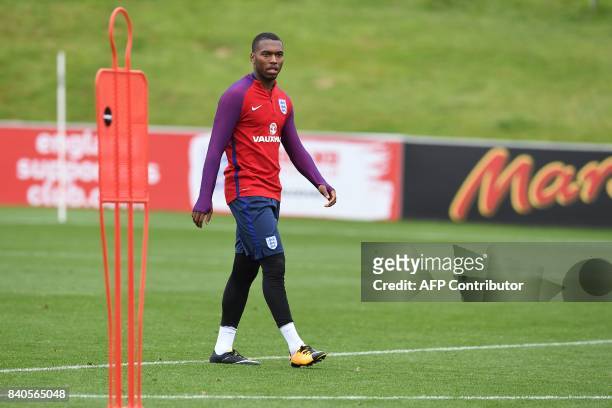 England's striker Daniel Sturridge attends a training session at St George's Park in Burton-on-Trent on August 29 as part of an England football team...