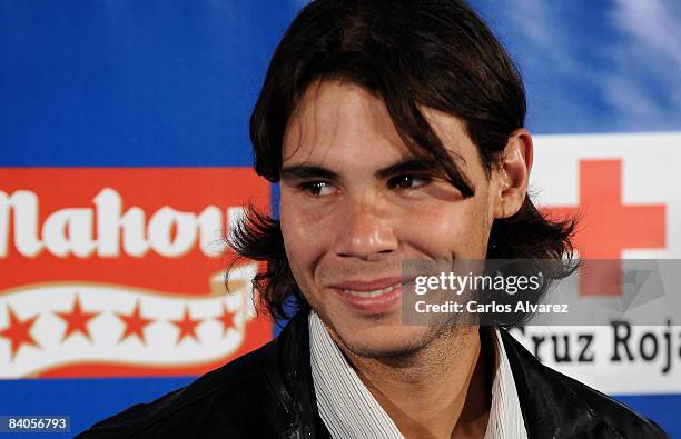 Spanish tennis star Rafael Nadal attends the 'Iker Vs Rafa' charity game to help against Malaria photocall at the Palacio de Deportes de la Comunidad...