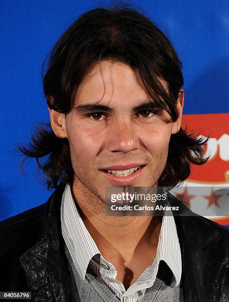 Spanish tennis star Rafael Nadal attends the 'Iker Vs Rafa' charity game to help against Malaria photocall at the Palacio de Deportes de la Comunidad...