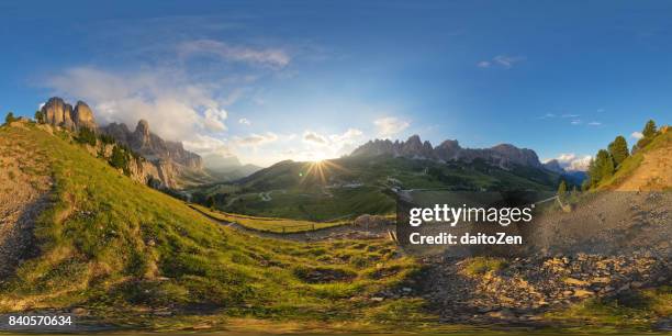 360-degree panorama of mountain roads leading to passo gardena mountain pass with sella group, langkofel and pizes de cir mountain range, gardena valley, dolomites, unesco world heritage, south tyrol, italy - 360度視点 ストックフォトと画像