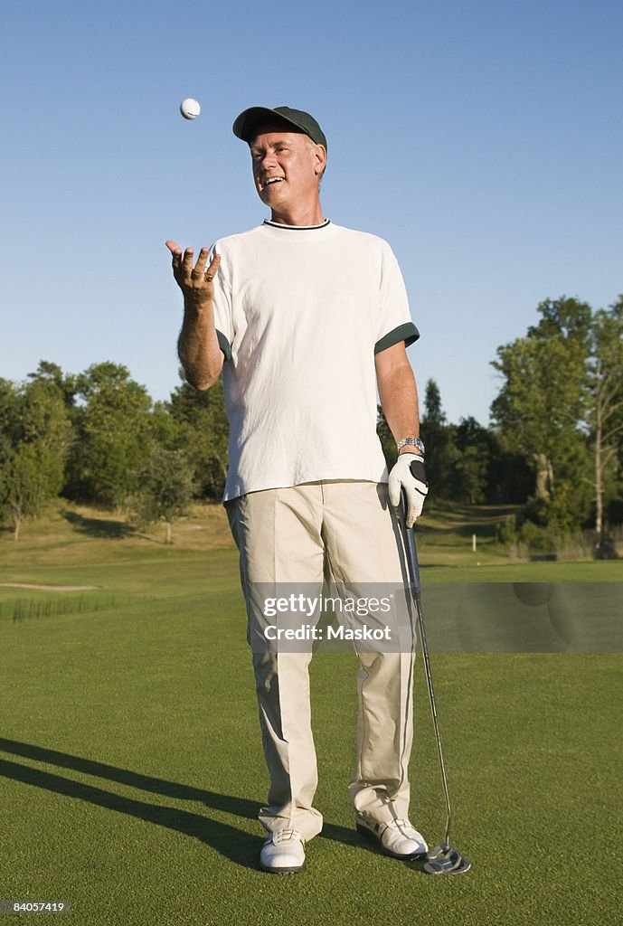 Man with golfball