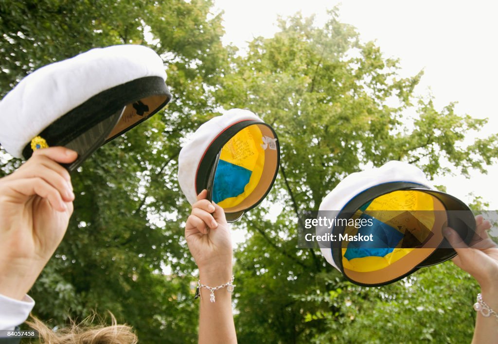 Three graduation caps