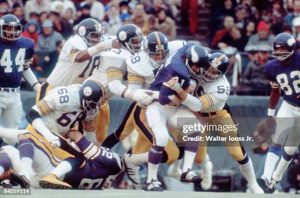 Super Bowl IX: Pittsburgh Steelers Jack Ham , Jack Lambert , Ernie Holmes and Dwight White in action, tackle vs Minnesota Vikings Dave Osborn . New...