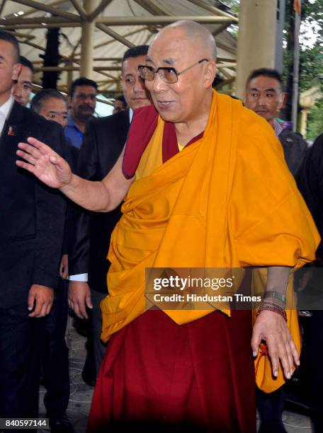 Tibetan spiritual leader the Dalai Lama greets devotees as he arrives at the Tsuglakhang Temple on August 29, 2017 in Dharamsala, India. The Tibetan...