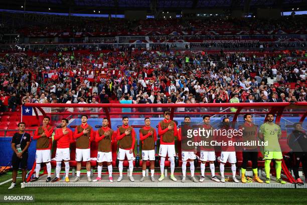 The Chile bench lines up for the national anthems ahead of the FIFA Confederations Cup Russia 2017 Semi-Final match between Portugal and Chile at...