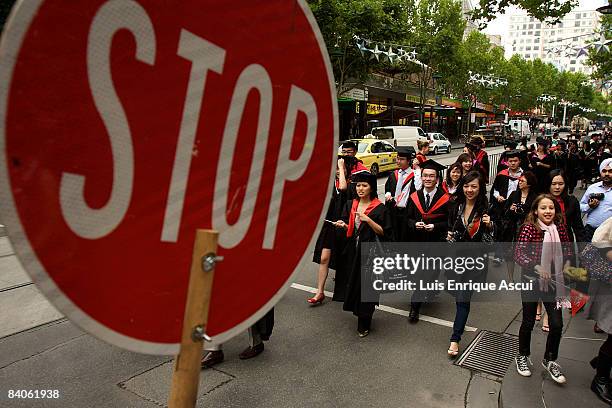 Graduates march through the Melbourne CBD on December 17, 2008 in Melbourne, Australia. RMIT students took part in a parade on Swanston Street to...