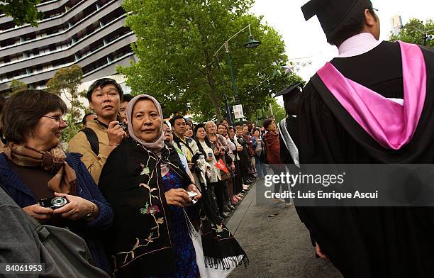 Graduates march through the Melbourne CBD on December 17, 2008 in Melbourne, Australia. RMIT students took part in a parade on Swanston Street to...
