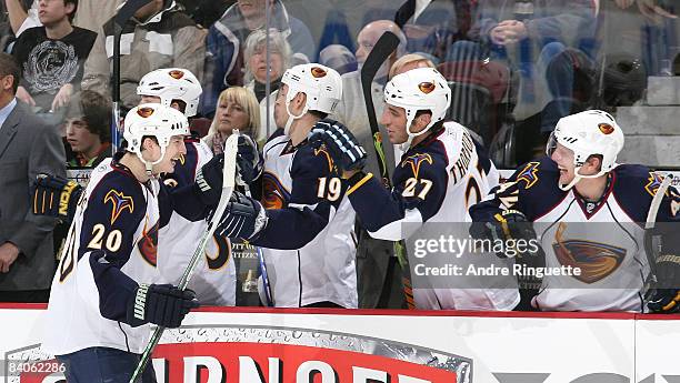 Colby Armstrong of the Atlanta Thrashers celebrates his goal against the Ottawa Senators at the team bench at Scotiabank Place on December 16, 2008...