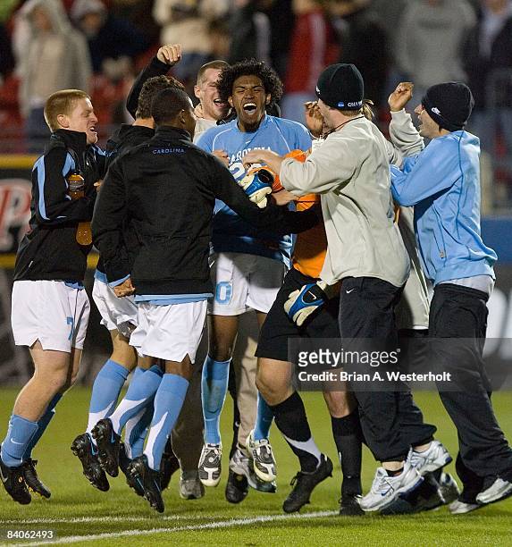 Sheanon Williams of the North Carolina Tar Heels celebrates with teammates after defeating the Wake Forest Demon Deacons 1-0 in the first semifinal...