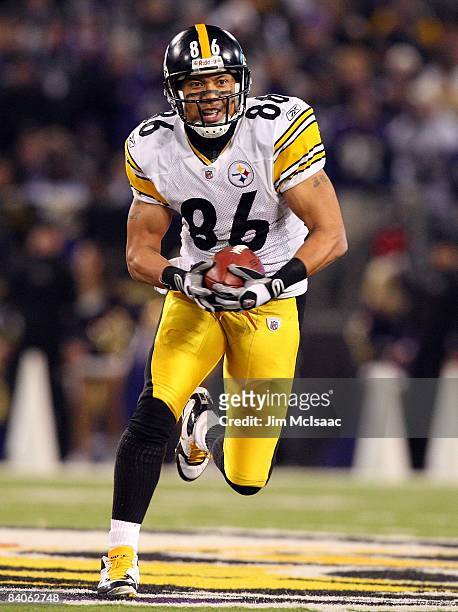 Hines Ward of the Pittsburgh Steelers runs the ball against the Baltimore Ravens on December 14, 2008 at M&T Bank Stadium in Baltimore, Maryland. The...
