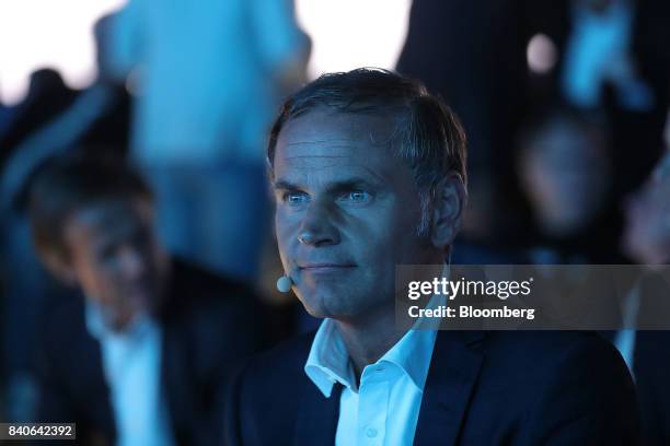 Oliver Blume, chief executive officer of Porsche AG, listens during a launch event for the new Cayenne sport utility vehicle in Stuttgart, Germany,...