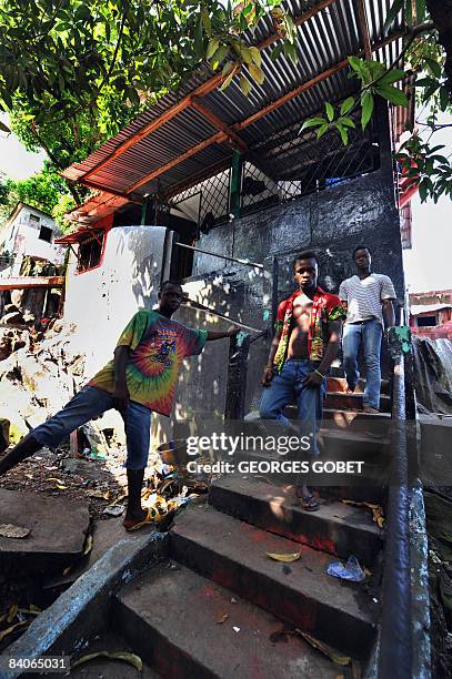 Prince Kortie "War Bus", one of the actors in the French movie 'Johnny Mad Dog' leaves with his friends the Johnny Mad Dog Foundation in Monrovia on...
