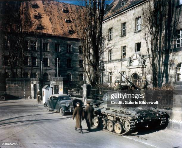 Tank in front of the Palace of Justice in Nuremberg, during proceedings against leading Nazi figures for war crimes at the International Military...