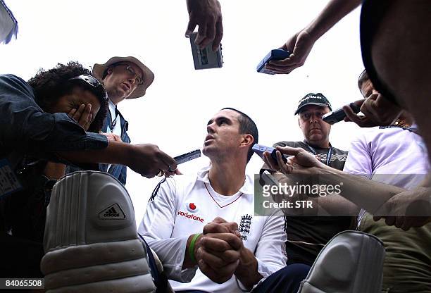 England cricket captain Kevin Pietersen talks to journalists following a training session in Mohali on December 17, 2008. England faced a selection...
