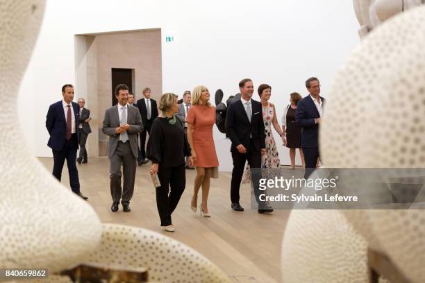 Grand Duchess Maria Teresa of Luxembourg, Brigitte Macron-Trogneux, France's first lady, Luxembourg Prime Minister's husband Gauthier Destenay and...