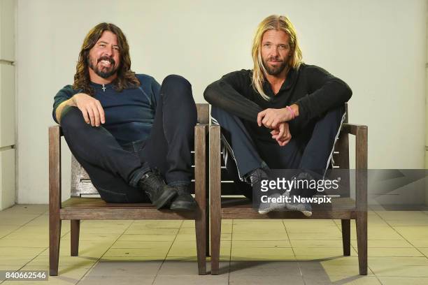 Dave Grohl and Taylor Hawkins pose during a photo shoot at the Intercontinental Hotel in Sydney, New South Wales.