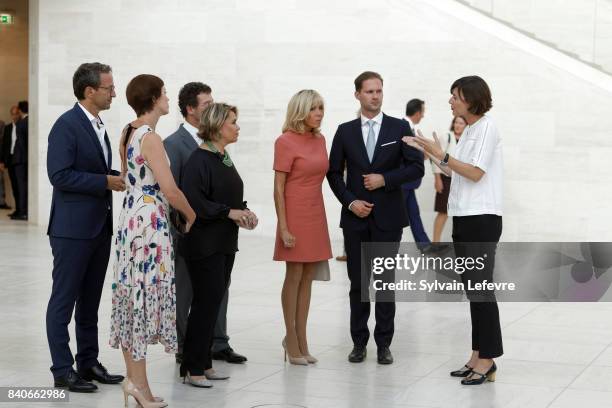 Belgian Prime Minister's partner Amelie Derbaudrenghien, Grand Duchess Maria Teresa of Luxembourg, Brigitte Macron-Trogneux, France's first lady,...