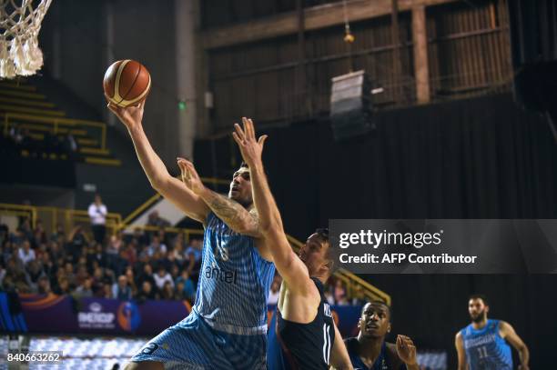 Uruguay's Esteban Batista goes for the basket during their 2017 FIBA Americas Championship basketball match against the USA in Montevideo, on August...