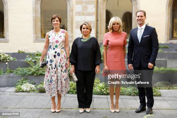 Belgian Prime Minister's partner Amelie Derbaudrenghien, Grand Duchess Maria Teresa of Luxembourg, Brigitte Macron-Trogneux, France's first lady,...