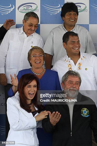 Argentina's President Cristina Kirchner shares a joke with Brazil's President Luiz Inacio Lula da Silva , next to Chile's President Michele Bachelet...